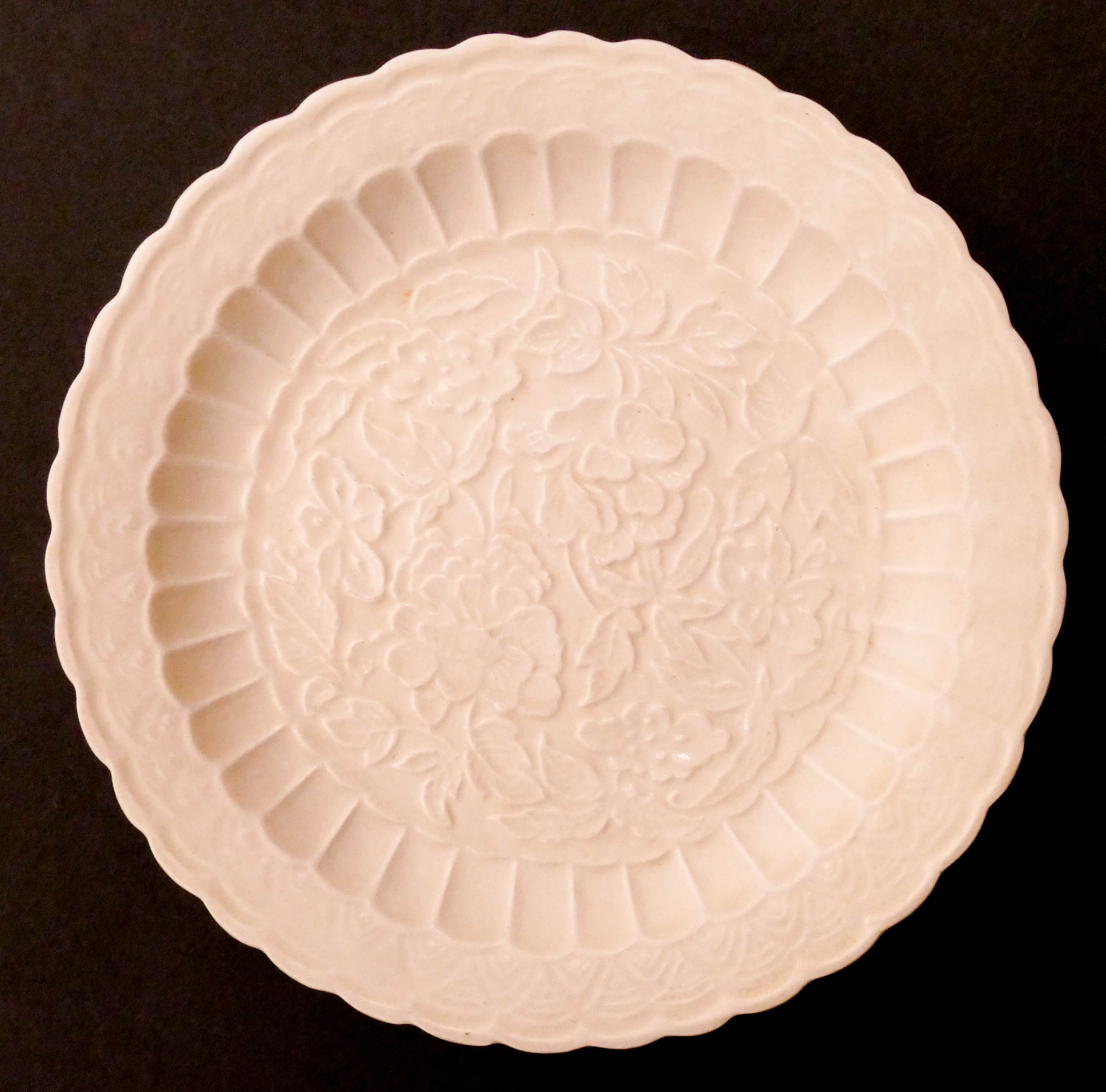 Appraisal: Chinese Ding Ware Molded Peony Dish '' A scarce scalloped