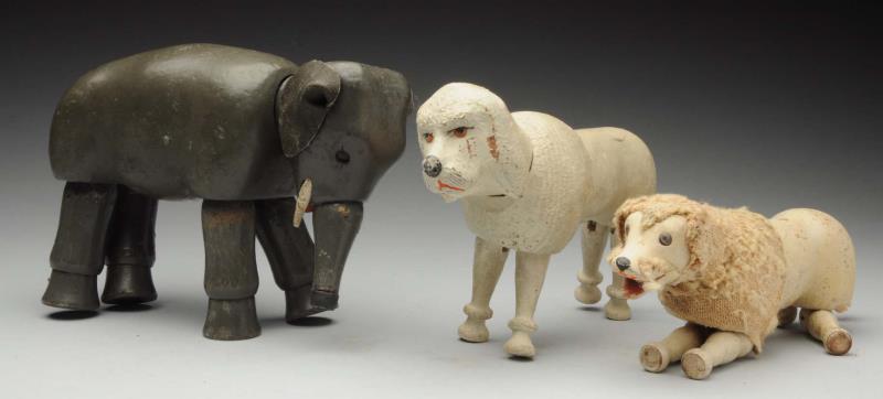 Appraisal: Lot Of Schoenhut Circus Toys Early glass-eyed poodle with worn