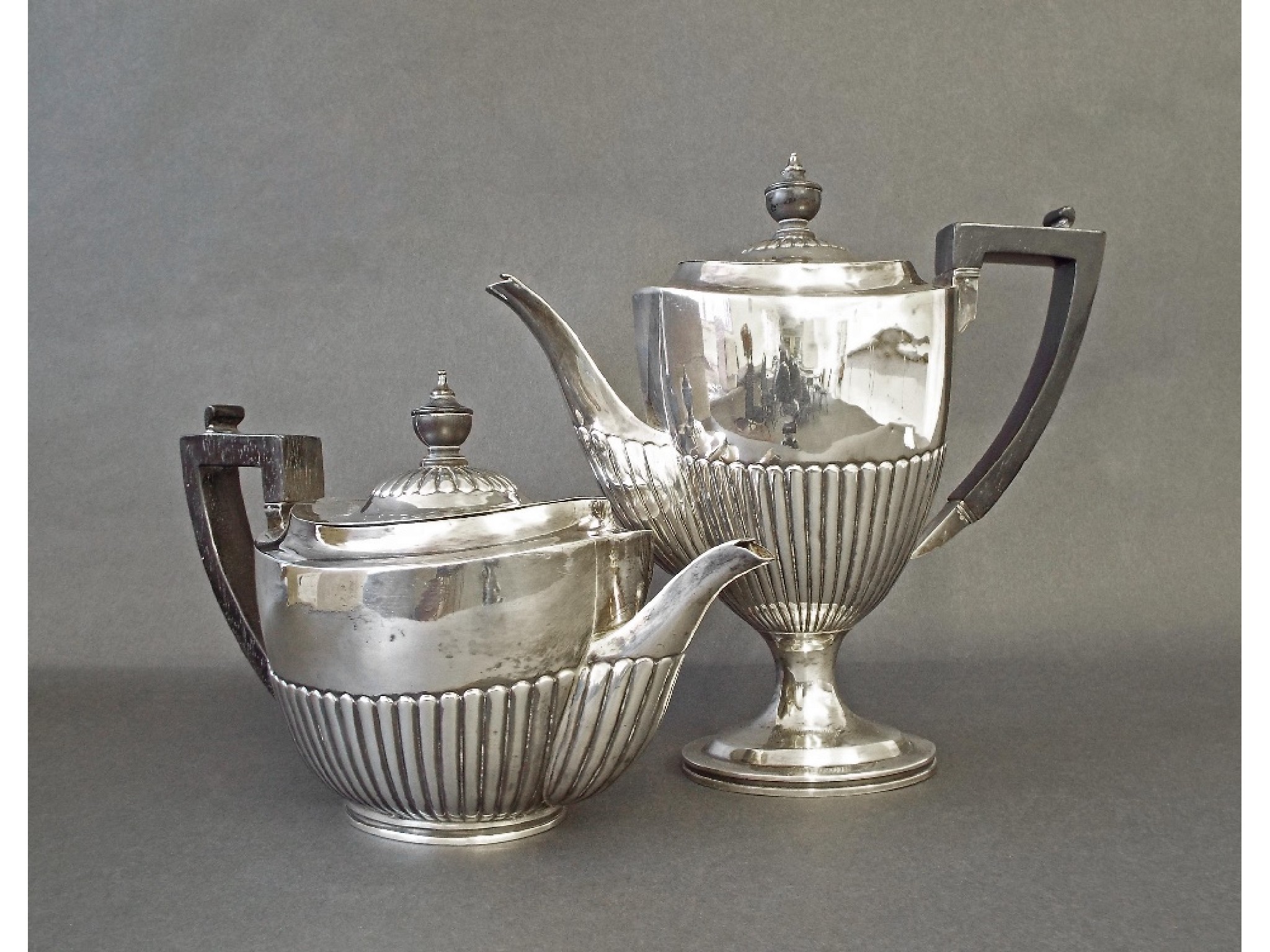 Appraisal: Victorian silver half fluted part tea service comprising teapot and