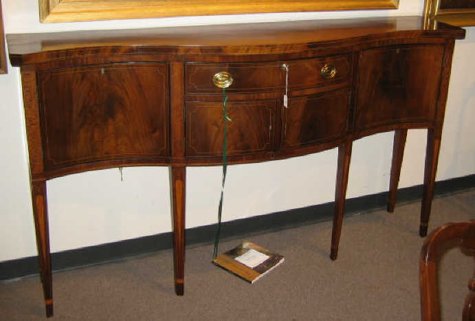 Appraisal: HEPPLEWHITE STYLE MAHOGANY SIDEBOARD The serpentine top above a conforming