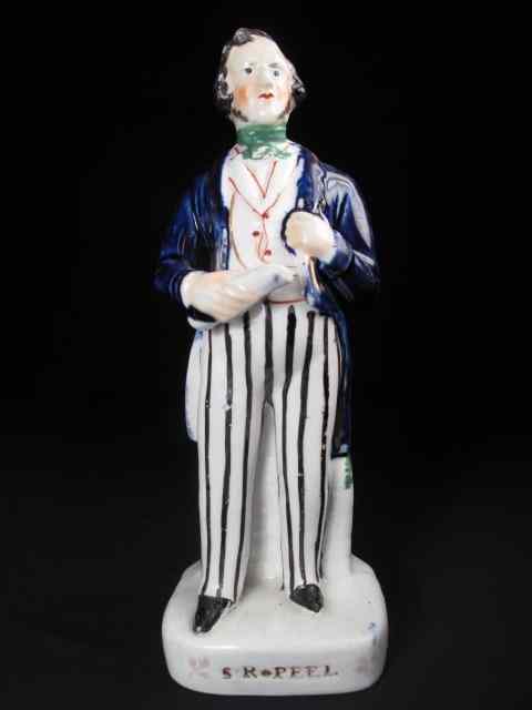 Appraisal: th century Staffordshire porcelain figurine Senior Peel Name is written