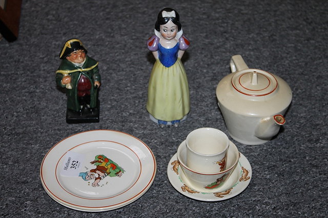 Appraisal: A WALT DISNEY SMALL TEAPOT decorated with Snow White two