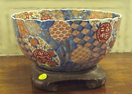 Appraisal: Japanese Imari bowl th C scalloped rim decorated in typical