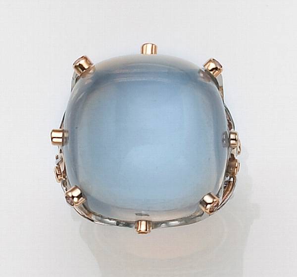 Appraisal: A moonstone diamond platinum and eighteen karat gold ring the