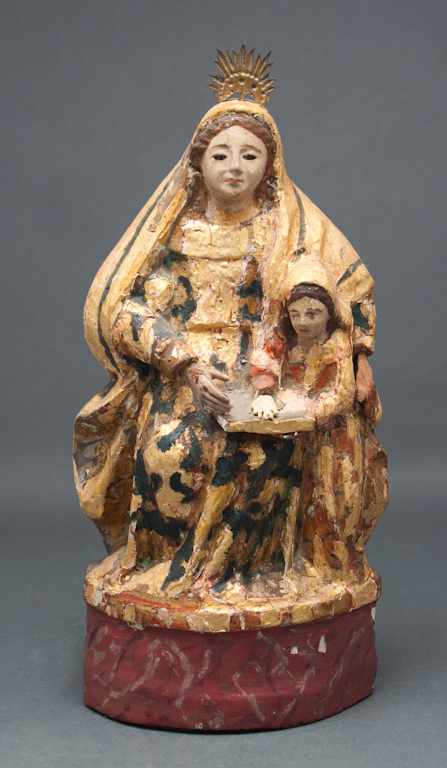 Appraisal: Spanish Colonial carved and polychrome wood figural group of the