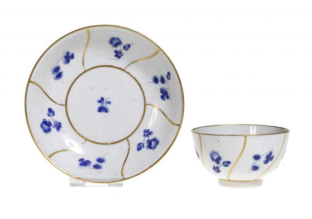 Appraisal: A WORCESTER TEA BOWL AND SAUCER enamelled in Dry Blue