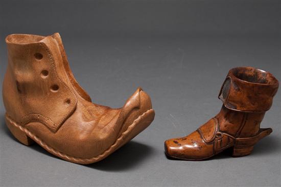 Appraisal: Continental carved satinwood shoe-form vase and a larger shoe-form vase