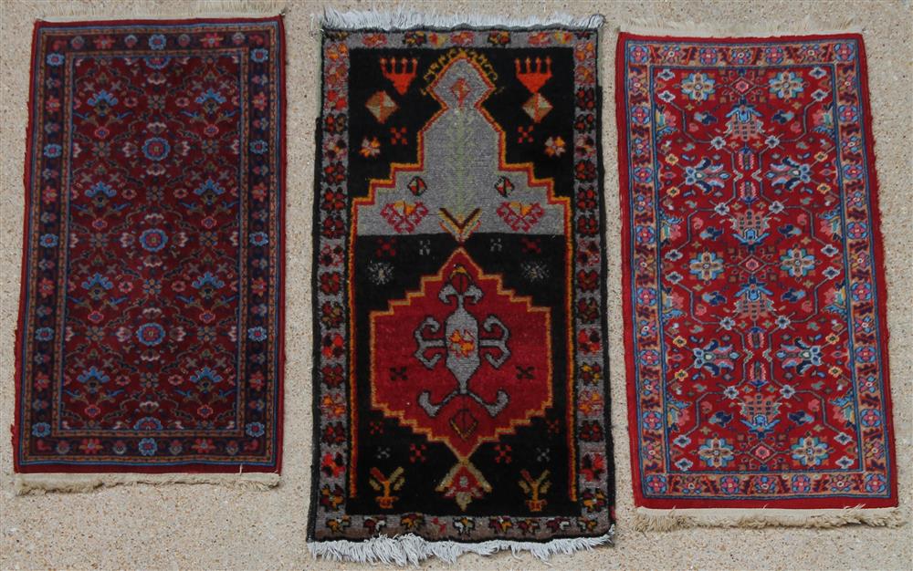 Appraisal: THREE SMALL RUGS A TRIBAL WOOL RUG TOGETHER WITH A