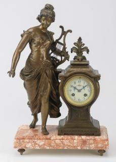 Appraisal: French mantel clock with rose marble th c French patinated