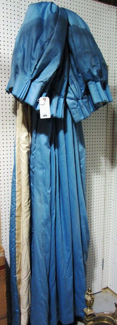 Appraisal: Two pairs of blue silk lined and interlined curtains