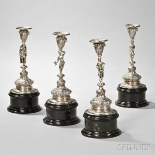 Appraisal: Four Continental Silver Figural Candlesticks probably Hanau Germany late th