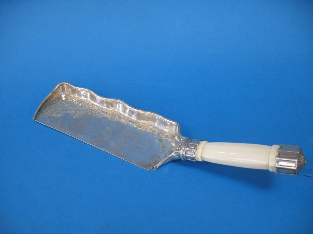 Appraisal: OMAR RAMSDEN A SILVER MOUNTED CRUMB SCOOP with a faceted