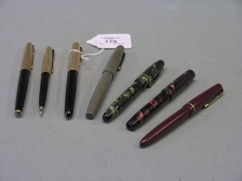 Appraisal: Two mid th century fountain pens marbled finishing four Parker