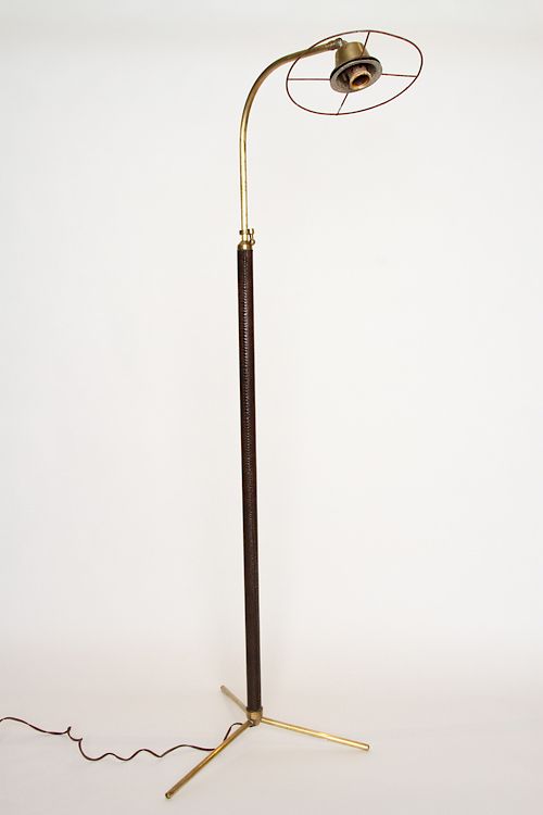 Appraisal: BRONZE LEATHER FLOOR LAMP JACQUES ADNET C An adjustable bronze