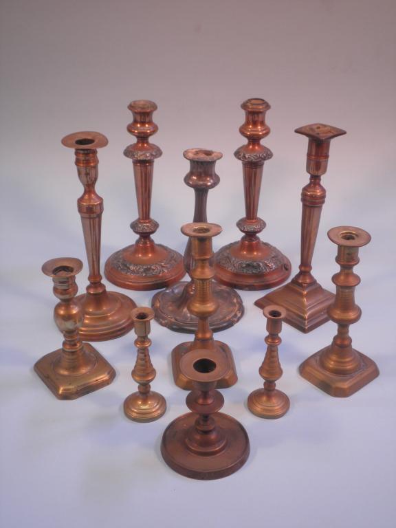 Appraisal: A pair of old Sheffield plate candlesticks and various brass