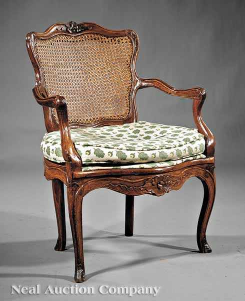 Appraisal: A Louis XV Carved Beechwood Fauteuil late th c caned