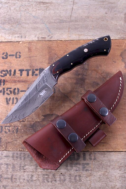 Appraisal: Montana Territory Knives Damascus Buffalo Knife This is an original