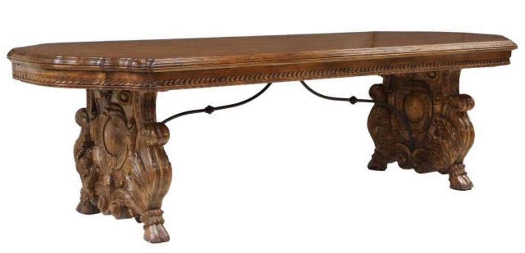 Appraisal: Large ornately carved walnut dining table late th c shaped