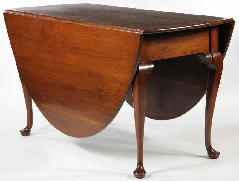 Appraisal: Pug Moore Queen Anne Style Drop Leaf Dining Tablesolid mahogany