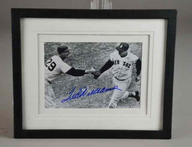 Appraisal: TED WILLIAMS AUTOGRAPHED PHOTO FRAMEDAutographed black white photo of Ted