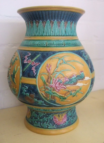 Appraisal: A Chinese moulded polychrome ceramic vase th Century of baluster