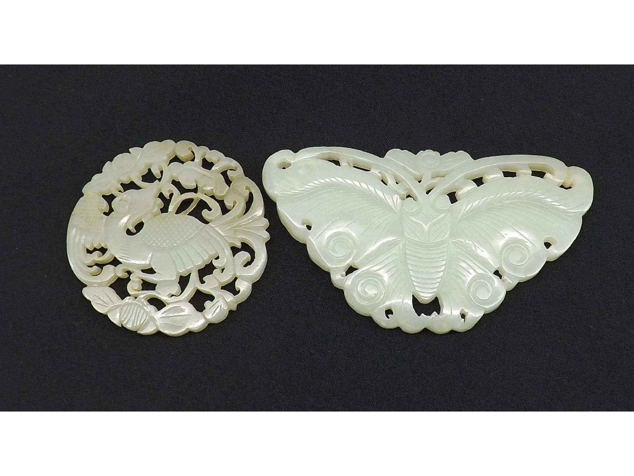 Appraisal: Pale celadon jade pendant carved in the form a butterfly