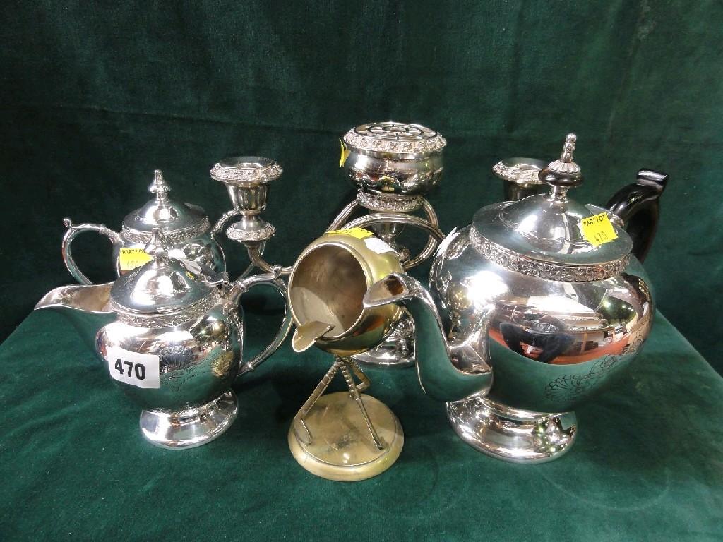 Appraisal: A three piece silver plated tea service with engraved shell