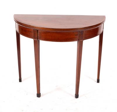 Appraisal: A George III mahogany and satinwood crossbanded card table the