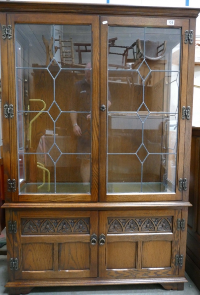 Appraisal: Oak glazed quality display cabinet with priory style with two