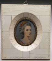 Appraisal: MINIATURE ON IVORY PORTRAIT OF A YOUNG WOMAN The oval