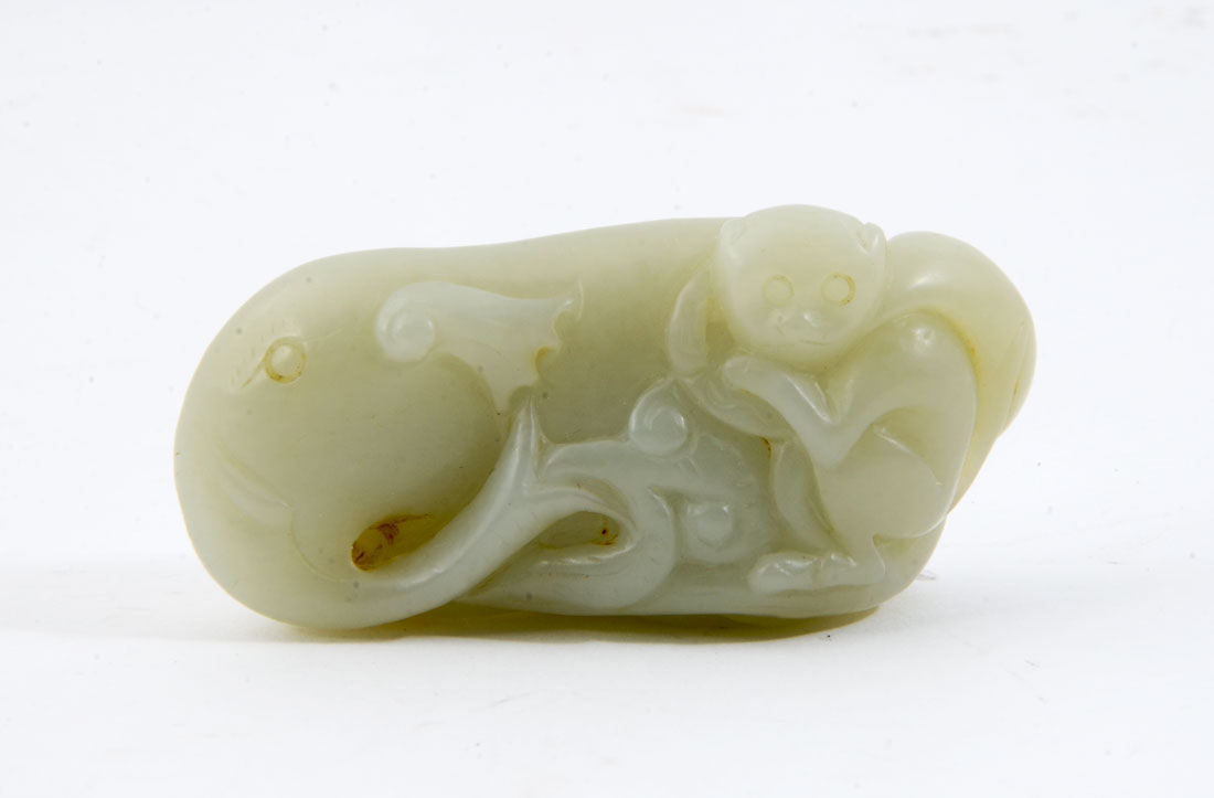 Appraisal: CHINESE CARVED JADE MONKEY ON ELEPHANT FIGURAL GROUP Carved green