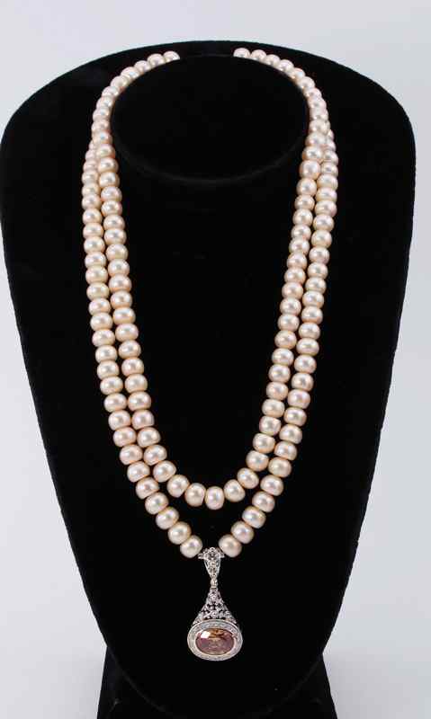 Appraisal: PEARL NECKLACE WITH STERLING PENDANT Sterling silver pendant contains CZ's