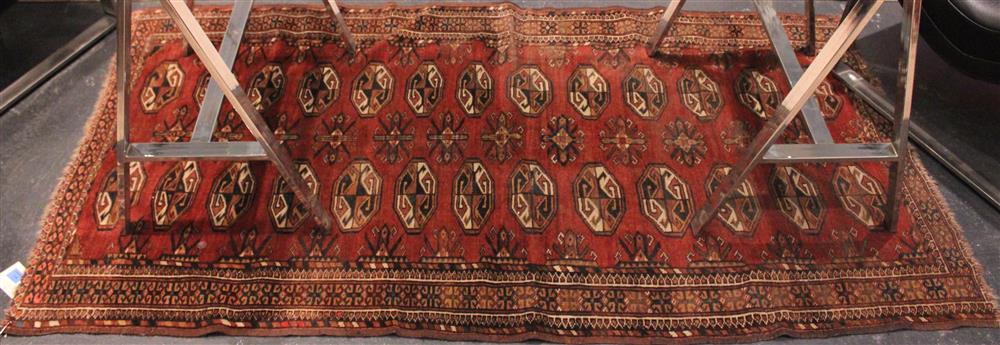 Appraisal: ANTIQUE BOKHARA RUG reddish brown field with black taupe and