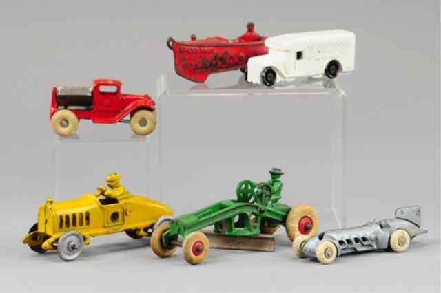 Appraisal: LOT OF SIX MISCELLANEOUS TOYS Includes a small rocket racer