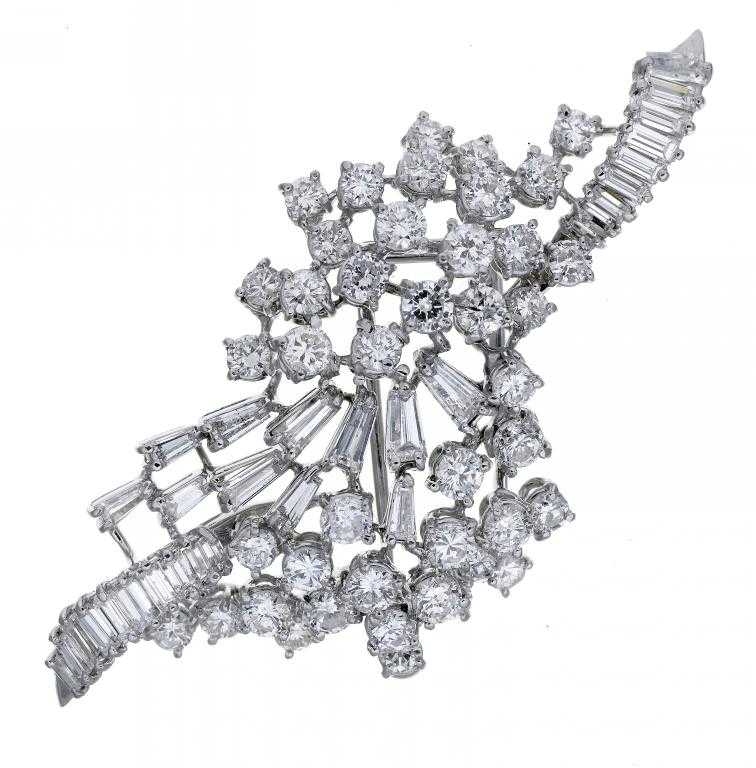 Appraisal: A DIAMOND CLIP-BROOCH of stylised spray form with round brilliant