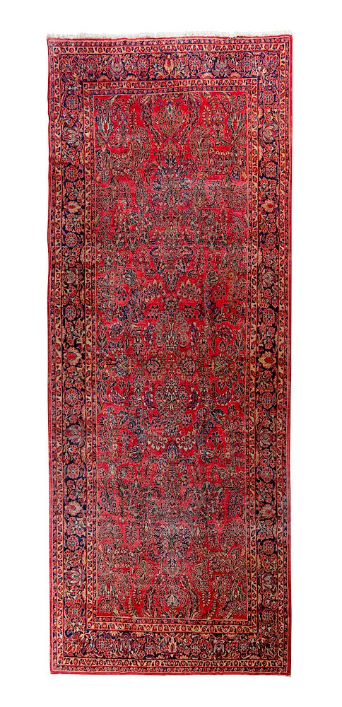 Appraisal: A Sarouk Wool Rug A Sarouk Wool Rug First Half