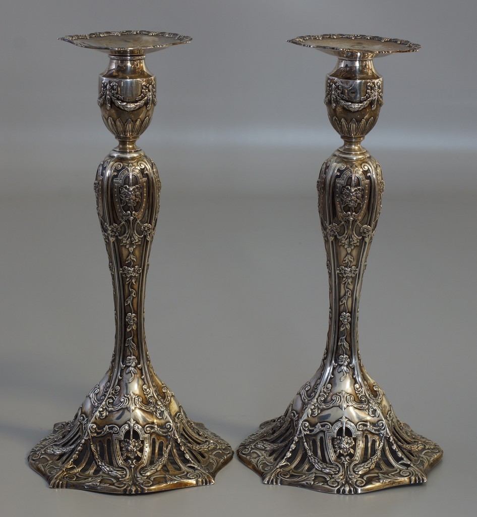 Appraisal: Pr weighted sterling silver cast and pierced candlesticks by Dominick