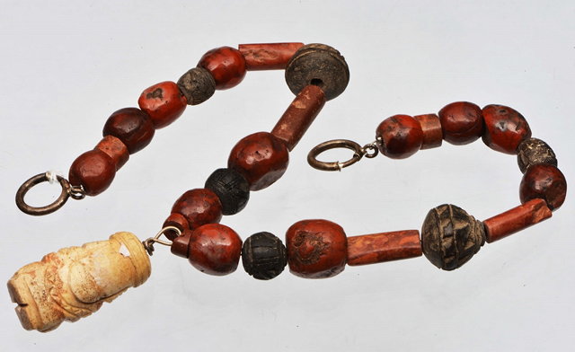 Appraisal: A PRE-COLOMBIAN BEAD NECKLACE with stone and clay beads and