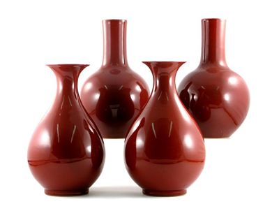 Appraisal: Four modern Chinese sang de boeuf glazed vases all bearing