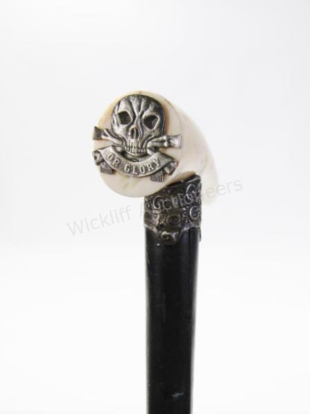 Appraisal: Tooth Handled Dress Cane tooth handle with applied medal decoration