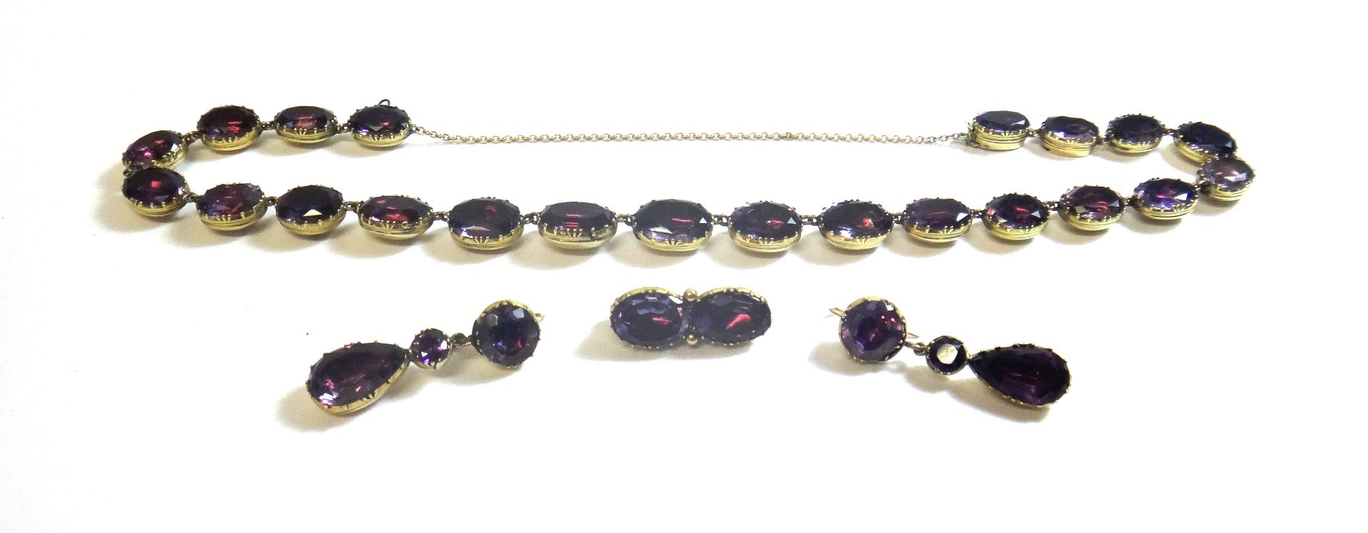 Appraisal: A foil backed amethyst set necklace formed as a row