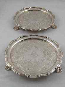 Appraisal: A pair of Georgian silver waiters with lobed rim on