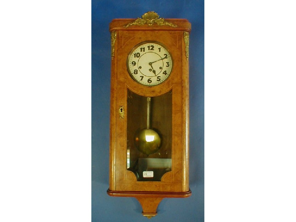 Appraisal: A Junghans burr walnut venereed wall clock with eight day