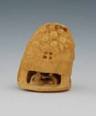 Appraisal: A Carved Ivory Netsuke of a Bamboo Hut The honey