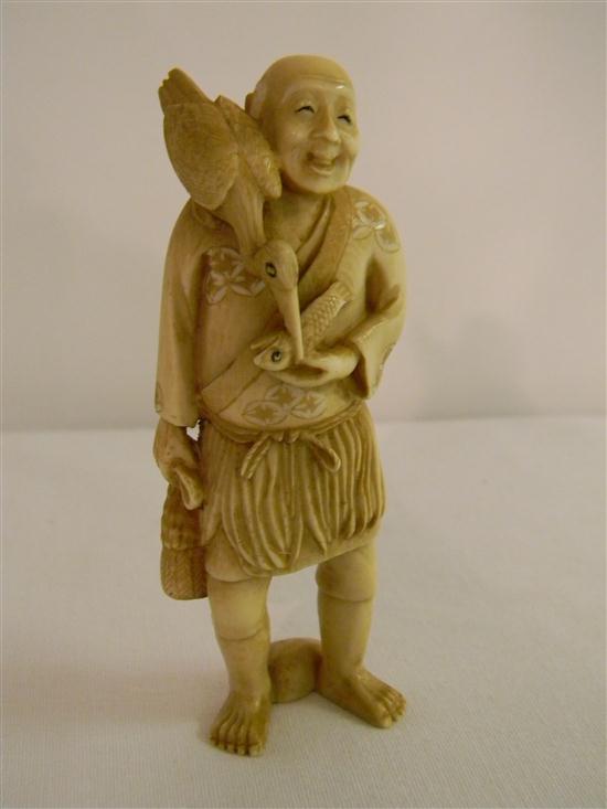 Appraisal: Japanese th C ivory figure of a man with a