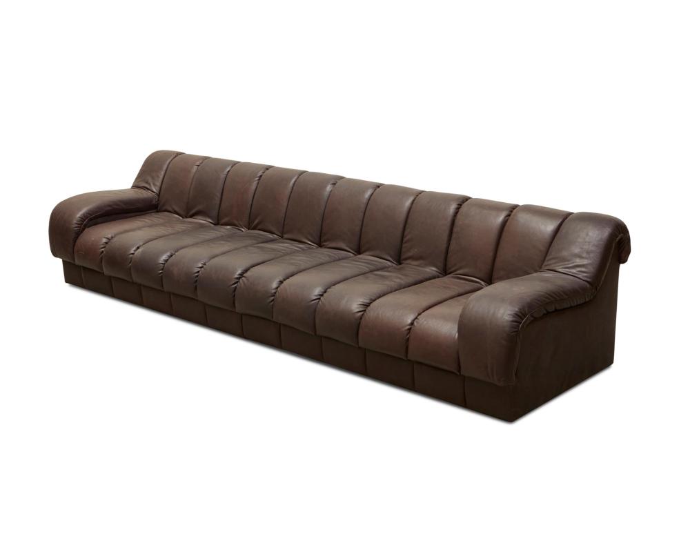 Appraisal: A custom De Sede-style leather sectional sofa st Century The