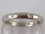 Appraisal: A French hallmarked platinum and diamond eternity ring mm wide