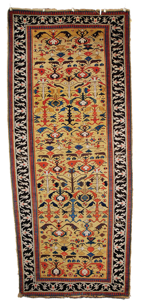 Appraisal: EXTRAORDINARY CAUCASIAN YELLOW FIELD RUG early th century feet x