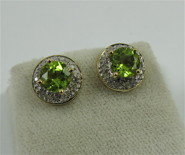 Appraisal: PAIR OF PERIDOT DIAMOND AND K GOLD EAR STUDS each