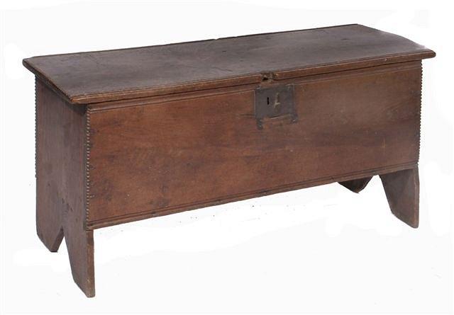 Appraisal: An antique oak six plank coffer wide